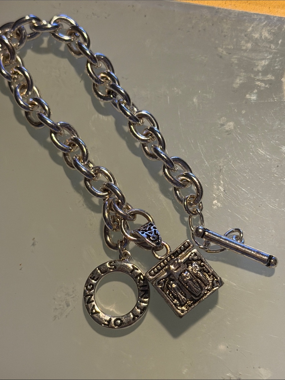 Trinity of Angels silver plated toggle bracelet chest with three angels